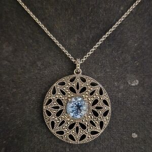 Marked Sterling silver. 925 Maracasite pendant necklace blue topaz solitar